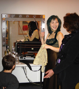 Yumi in her dressing room with her mother and nephew
